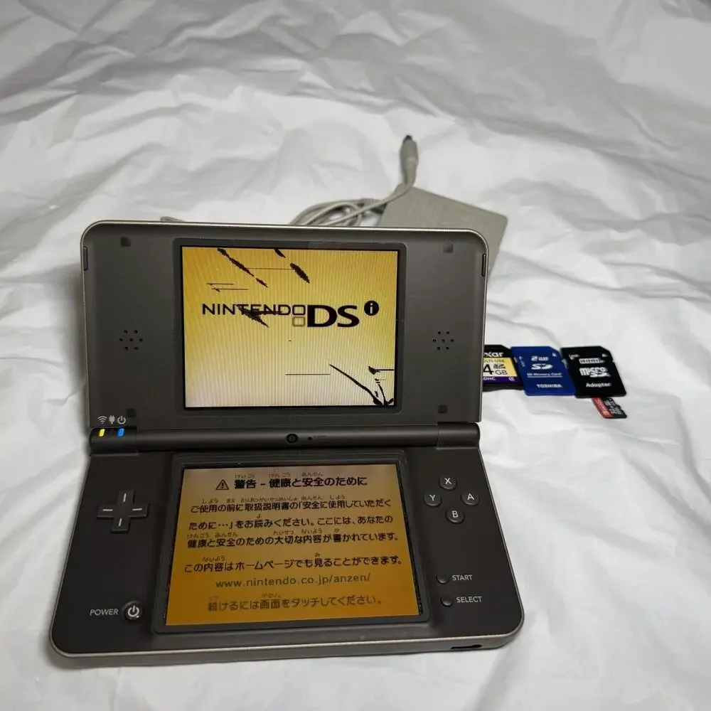 Nintendo DSi LL Bronze/Dark Brown Japanese Version Plays US Games RD DESCRIPTION